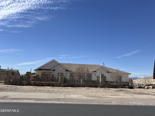 225 Peyton Rd, El Paso, TX 79928 - view of front of property featuring a fenced front yard and stucco siding