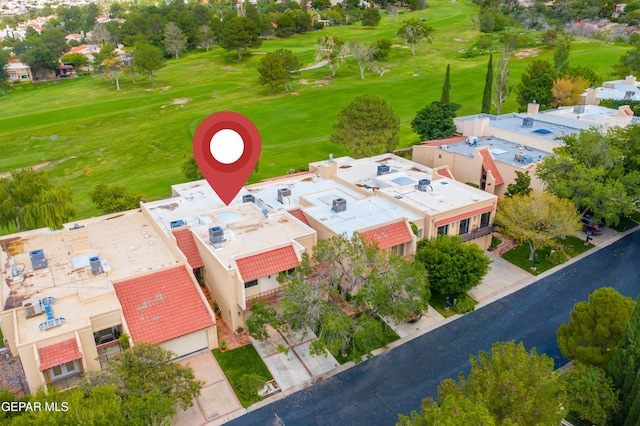 birds eye view of property featuring view of golf course