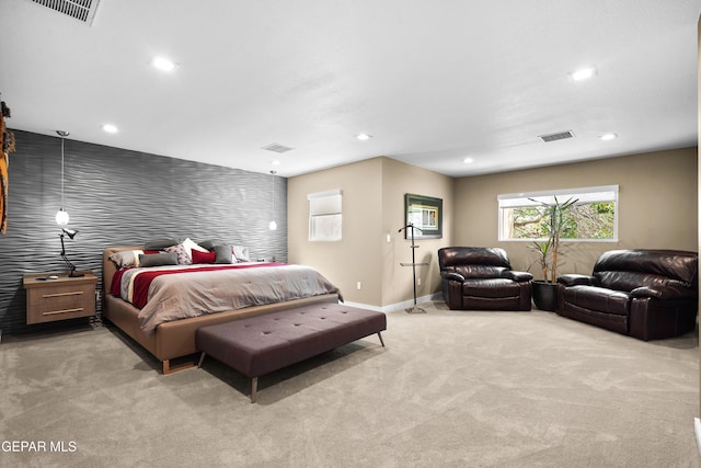 carpeted bedroom with baseboards, visible vents, and recessed lighting