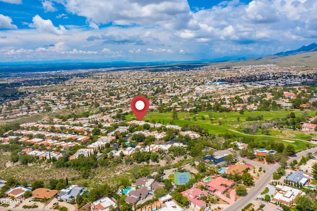 drone / aerial view with a residential view and a mountain view