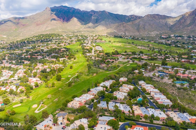 bird's eye view featuring a residential view, view of golf course, and a mountain view