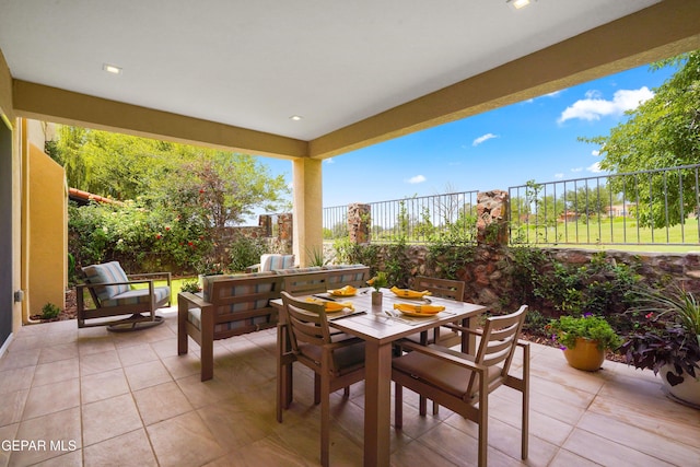 view of patio / terrace with a fenced backyard and outdoor dining area