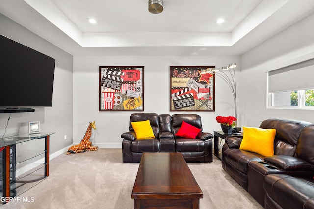 living area with baseboards, a raised ceiling, carpet flooring, and recessed lighting