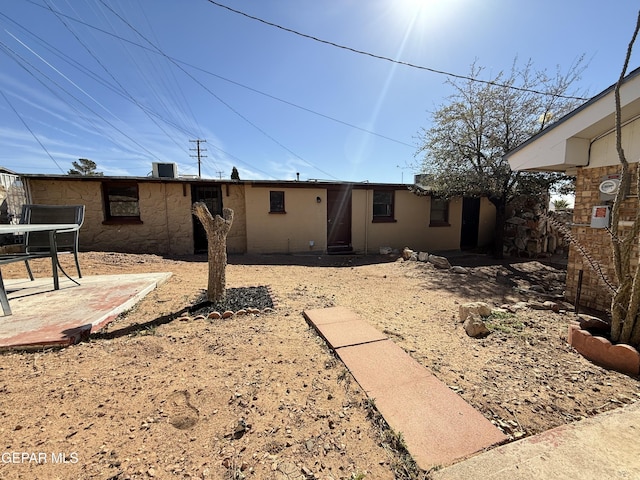 rear view of property with a patio