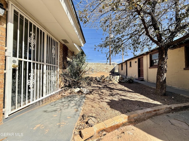 view of yard with entry steps