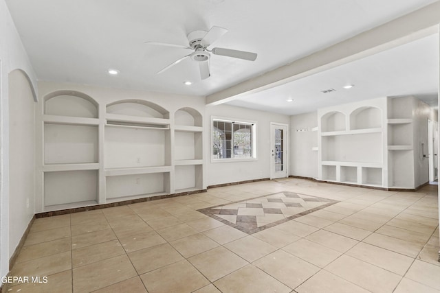 tiled empty room featuring built in features, baseboards, and recessed lighting