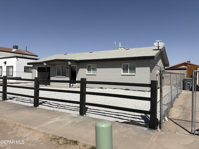 view of gate featuring fence