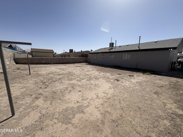 view of yard featuring fence