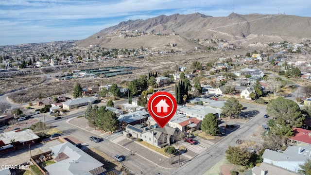 drone / aerial view with a residential view and a mountain view