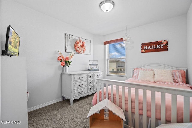 carpeted bedroom with baseboards