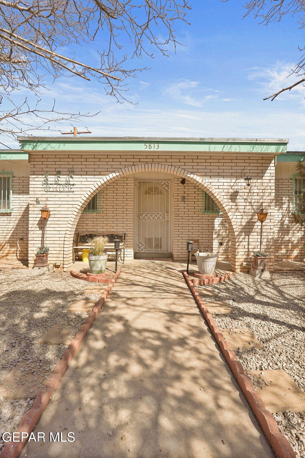 5813 Blackhawk Dr, El Paso, TX 79924 - exterior space with driveway and brick siding