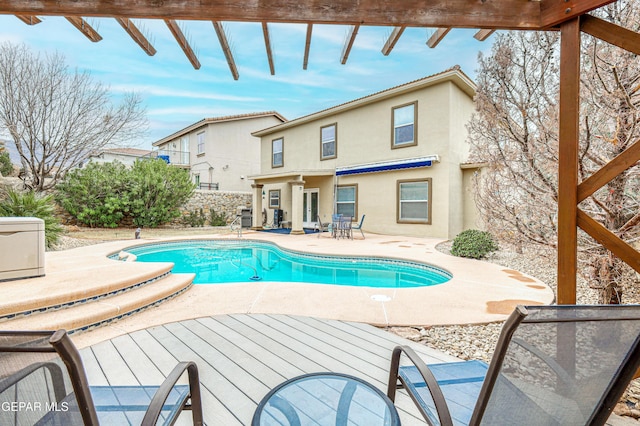 view of swimming pool with a patio area and a fenced in pool