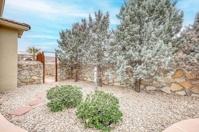 view of yard featuring fence