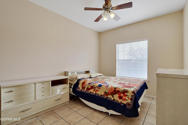 bedroom featuring light tile patterned floors and ceiling fan