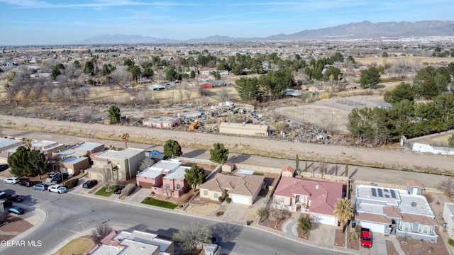 bird's eye view with a residential view and a mountain view