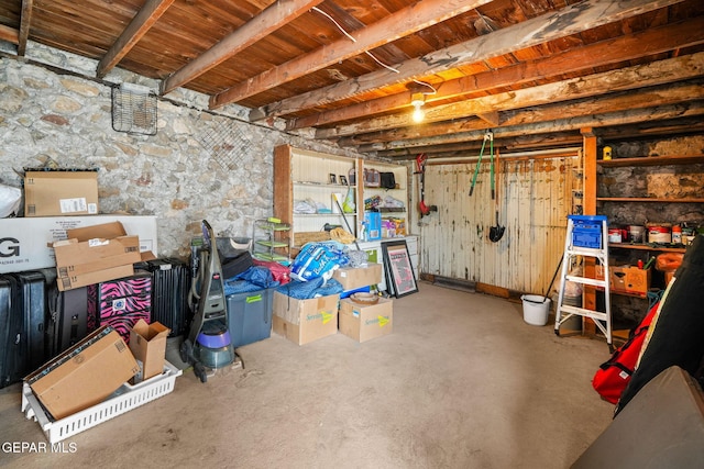 unfinished basement with wooden ceiling