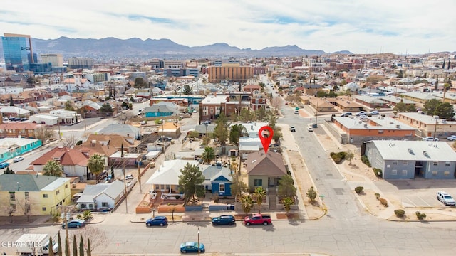 birds eye view of property featuring a mountain view