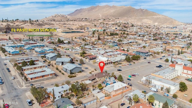 drone / aerial view with a residential view and a mountain view