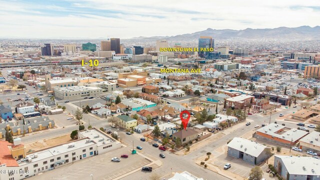 bird's eye view featuring a view of city and a mountain view