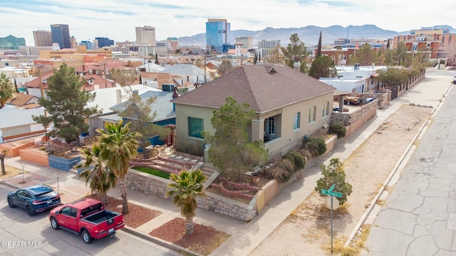 aerial view with a view of city and a mountain view