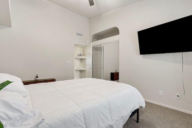 bedroom featuring carpet floors, visible vents, baseboards, and a ceiling fan