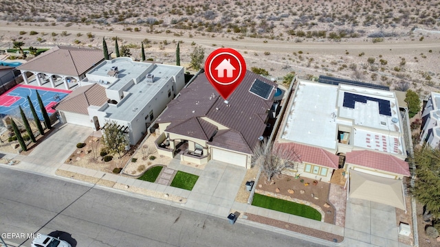 birds eye view of property featuring a desert view