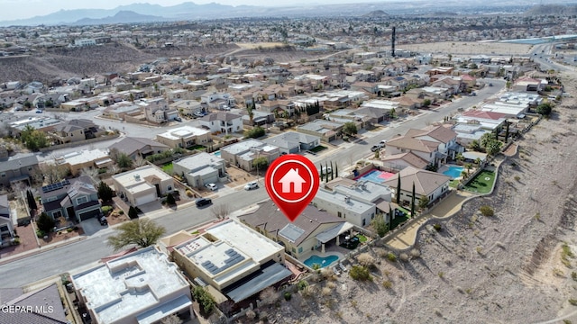 bird's eye view featuring a residential view and a mountain view