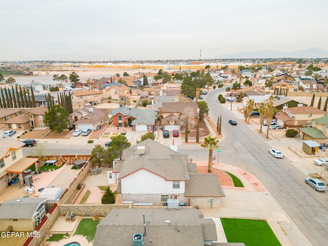 birds eye view of property with a residential view