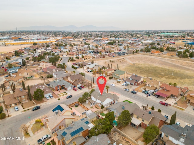 birds eye view of property with a residential view