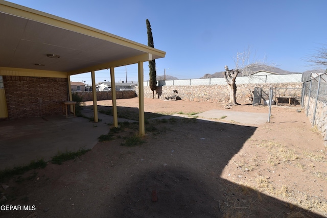 view of yard featuring a fenced backyard and a patio