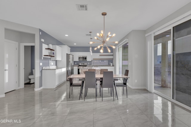 dining space with recessed lighting, visible vents, and baseboards