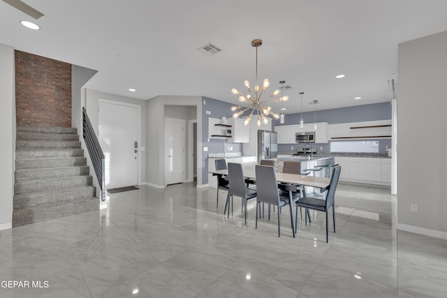 dining space with marble finish floor, recessed lighting, visible vents, a chandelier, and stairs