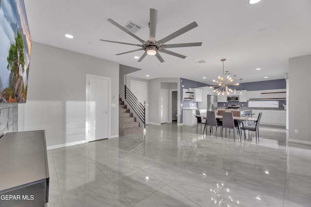 interior space featuring recessed lighting, visible vents, stairway, and baseboards