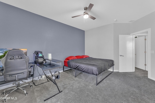 bedroom featuring ceiling fan, baseboards, and carpet flooring