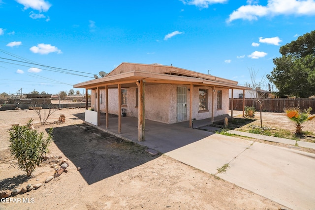 exterior space featuring fence