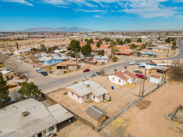 birds eye view of property with a mountain view and a residential view