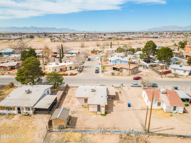 drone / aerial view featuring a mountain view and a residential view