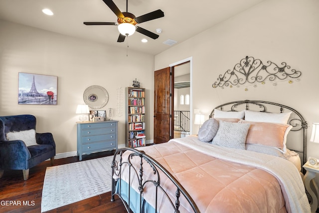 bedroom with visible vents, dark wood-type flooring, a ceiling fan, recessed lighting, and baseboards