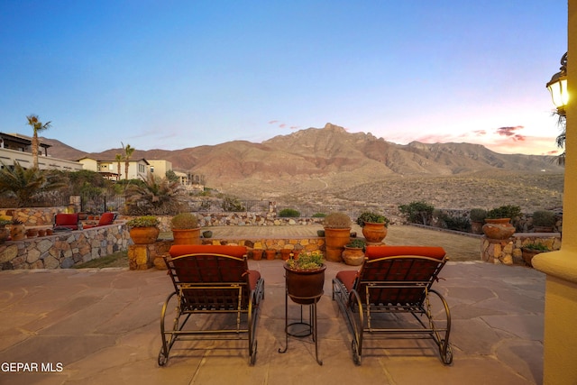 view of patio / terrace with a mountain view