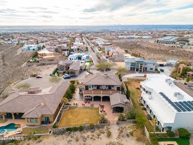 birds eye view of property with a residential view