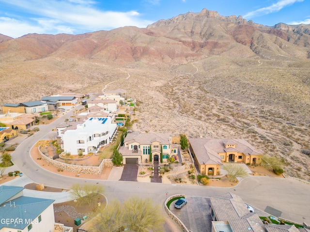 drone / aerial view featuring a mountain view and a residential view