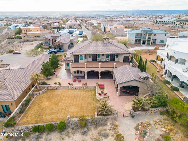 birds eye view of property with a residential view