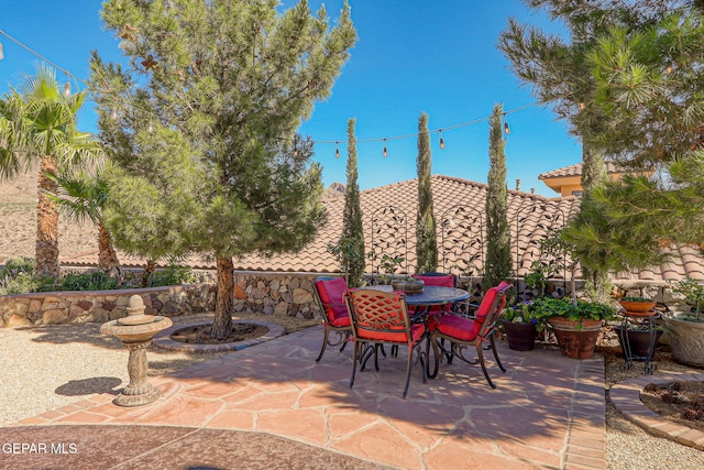 1408 Via Quijano Ln, El Paso, TX 79912 - view of patio / terrace featuring outdoor dining area