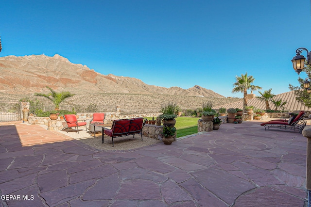 1408 Via Quijano Ln, El Paso, TX 79912 - view of patio / terrace featuring a mountain view and an outdoor living space