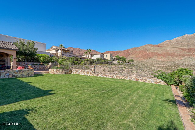 1408 Via Quijano Ln, El Paso, TX 79912 - view of grassy yard featuring a mountain view