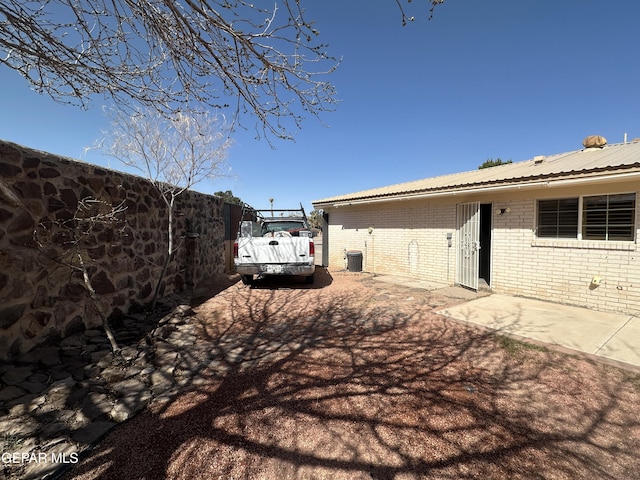 view of yard with fence and a patio area