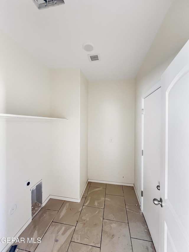 laundry room featuring laundry area, visible vents, and electric dryer hookup