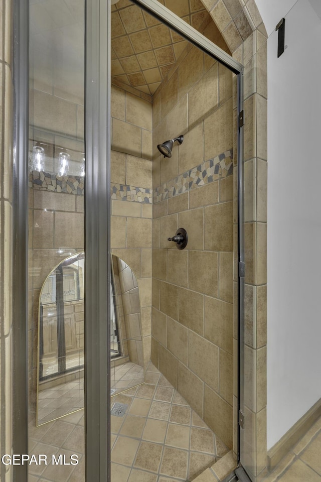 bathroom with a stall shower