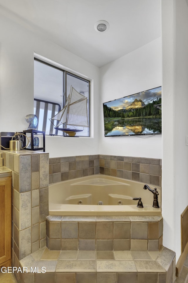 bathroom featuring a jetted tub