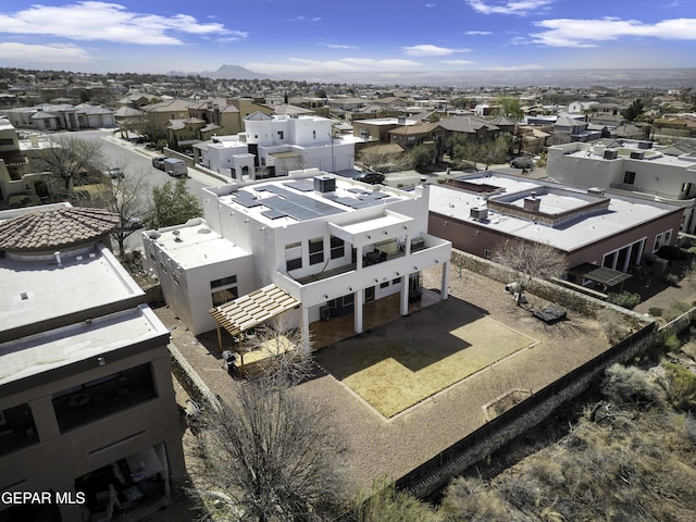 birds eye view of property with a residential view